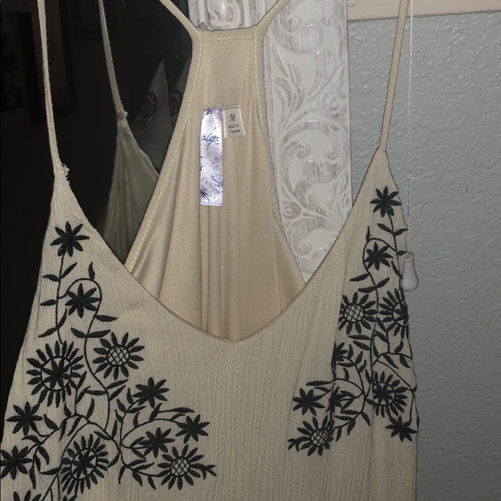 Francesca’s tan dress